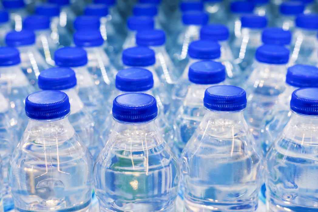 Many water bottles. Delivery bottles of mineral water.